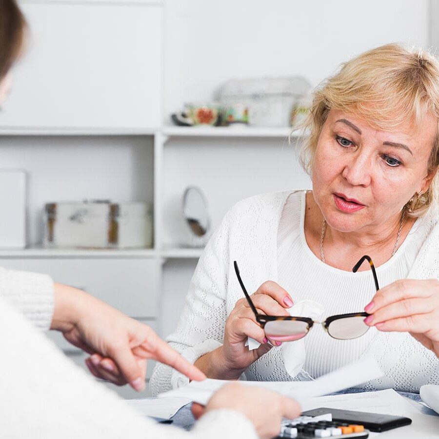 An Elmes Homecare manager discussing care arrangements with a family member